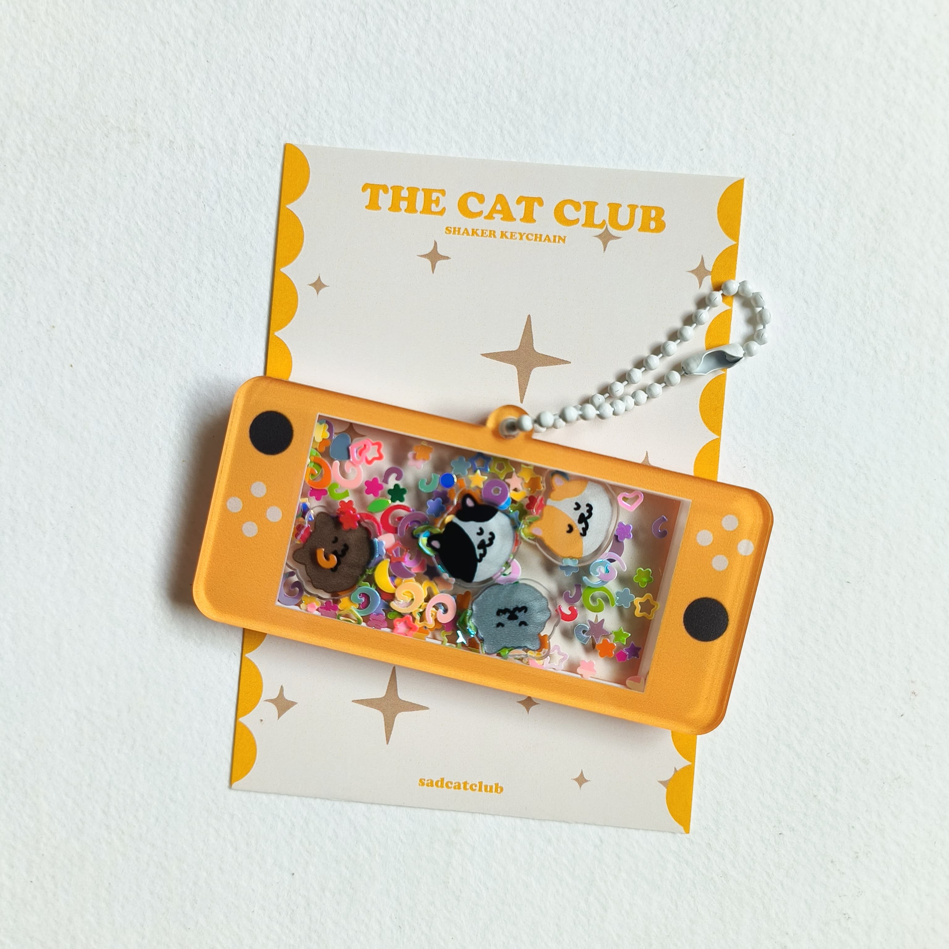 The Cat Club Orange Shaker Keychain